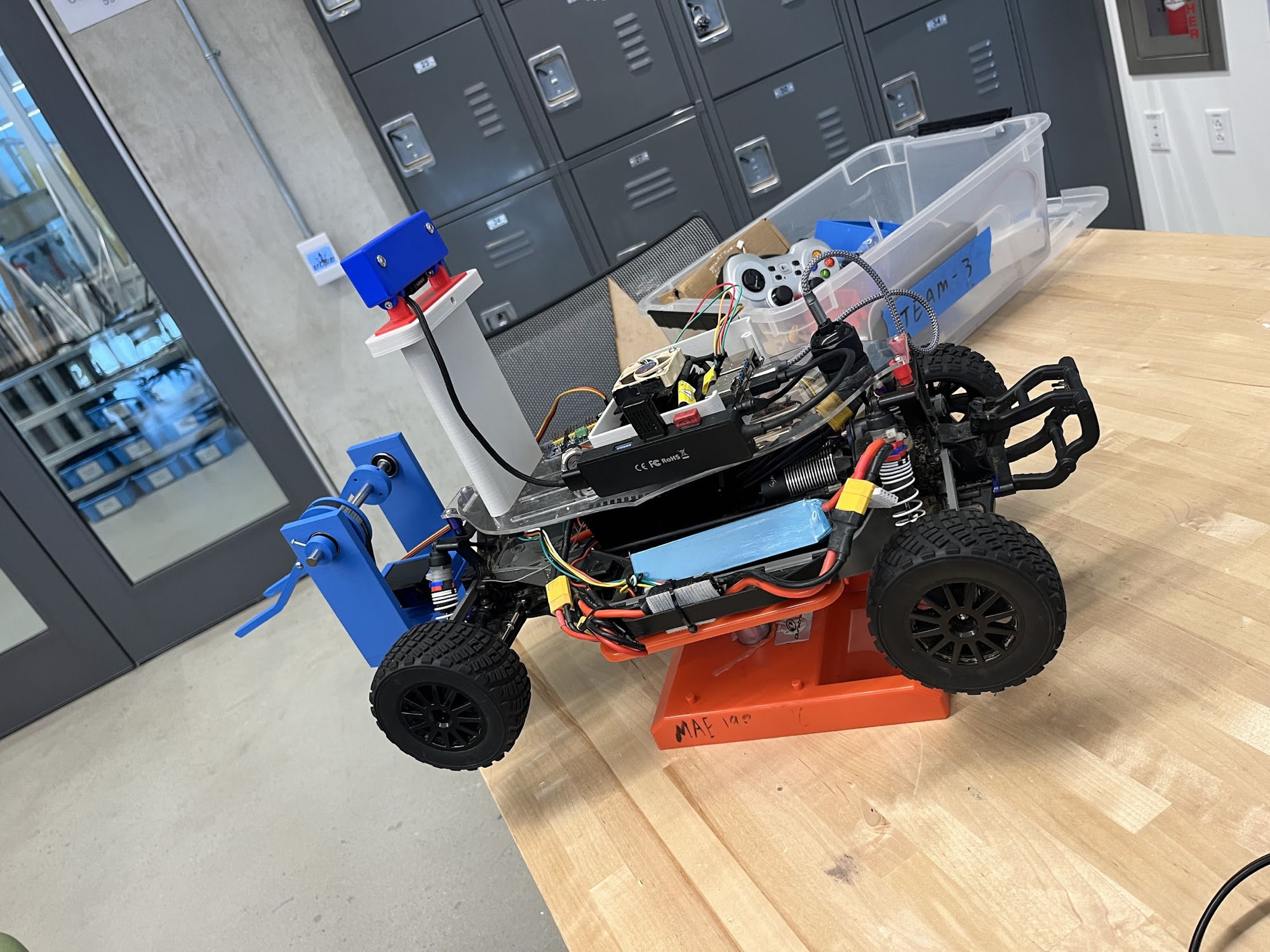 The finished 1/10-scale autonomous car with camera mast and onboard compute