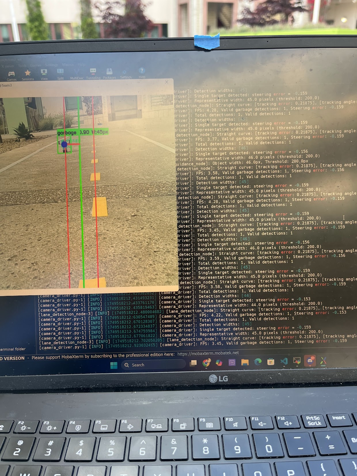 The car's perception stack detecting an object in the lane with a bounding box